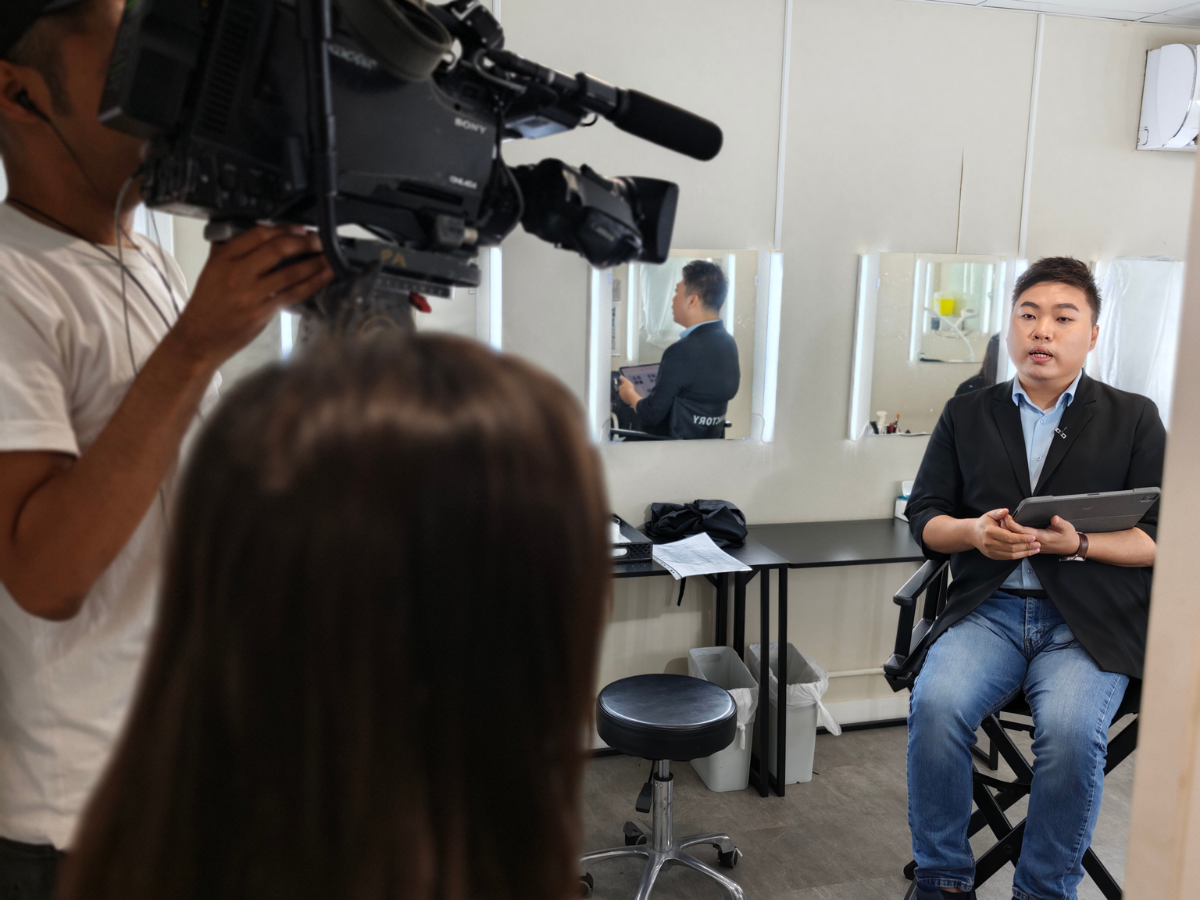 Image 2: Vice President Lawrance WONG (right) being interviewed by reporter Lai Wai Shan