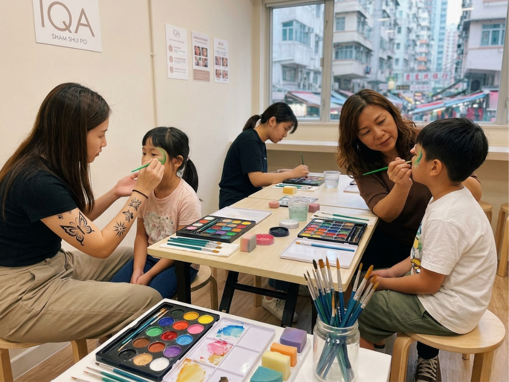 Face painting class – students practicing face painting on models with instructor guidance, showing a small‑class environment